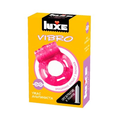 Розовое эрекционное виброкольцо Luxe VIBRO Ужас Альпиниста + презерватив В каждой фирменной упаковке содержится презерватив в смазке с виброкольцом розового цвета в комплекте - вашим главным и незаменимым помощником в удовлетворении любых прихотей партнерши. Виброкольцо универсально по размеру, а время непрерывной работы батарейки - около 30 минут. Страна: Китай. Материал: силикон.