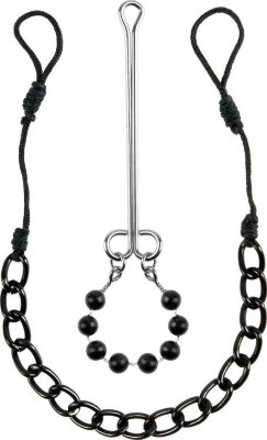 Интимные украшения с бусинами NIPPLE CLIT JEWELRY Набор, состоящий из украшения на грудь в виде цепочки (крепится на соски при помощи петли-лассо) и зажима на клитор с бусинами. Страна: Китай. Материал: металл.