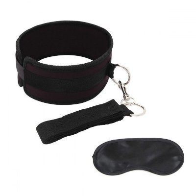 Черный ошейник с длинным поводком Collar and Leash Set Длина: 40.6 см. Чтобы превратить партнёра/партнёршу в раба, нужно так мало - широкий ошейник черного цвета с длинным поводком. Размер ошейника регулируется благодаря липучке, поводок пристегивается металлическим карабином. В комплекте сатиновая маска на глаза. Страна: Китай. Материал: 100% полиэстер.