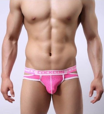 Розовые мужские трусы-брифы с вырезами и леопардовым рисунком Розовые мужские трусы-брифы с вырезами и леопардовым рисунком 85% Полиамид, 15% Эластан. Цвет Розовый. Размер XXL. Страна: Китай. Материал: 85% полиамид, 15% эластан.