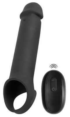 Черная вибронасадка для пениса с хомутом для мошонки и пультом ДУ Remote Controlled Penis Extension Длина: 25 см. Диаметр: 4.8 см. Эластичная насадка для пениса с вибрацией и хомутом для яичек, предназначенная для увеличения длины пениса и поддержки эрекции. Головная часть насадки увеличивает длину пениса до 8 см. Насадка плотно облегает пенис и легко надевается. Хомут для яичек обеспечивает надёжную фиксацию и помогает удерживать насадку на месте во время использования. Встроенный вибромотор имеет 10 режимов вибрации, управляемых с помощью беспроводного пульта (дальность до 12 метров). Рабочая длина - 19 см. Длина полости - 12 см, диаметр - 3,8 см. Страна: Китай. Материал: силикон. Батарейки: встроенный аккумулятор.