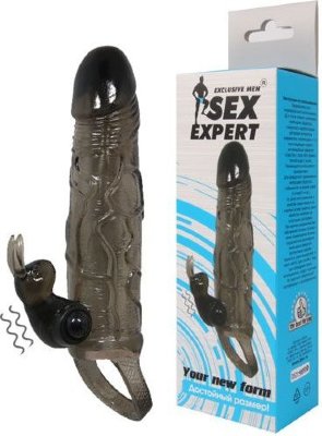 Насадка на член с вибрацией Sex Expert Your New Form Диаметр: 3.7 см. Шикарная насадка на пенис с кольцом для мошонки сделает сексуальную жизнь насыщенной и яркой! Мягкая, приятная на ощупь поверхность, четко очерченная головка, текстурные венки и небольшие ребрышки подарят множество незабываемых мгновений. Секс-игрушка» увеличит половой член на 3,5 см, а кольцо для мошонки существенно продлит интимную близость. Приспособление для стимуляции клитора в виде зайчика добавит приятных эмоций. Длина без подхвата - 16,4 см. Страна: Китай. Материал: термопластичная резина (TPR). Батарейки: 3 шт., тип L736 (LR41, SR41).