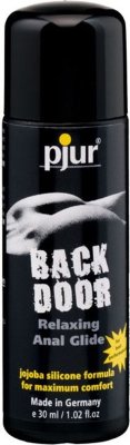 Концентрированный анальный лубрикант pjur BACK DOOR glide - 30 мл. Благодаря этому концентрированному лубриканту анальный секс станет еще более комфортным, чем прежде. Смазка на силиконовой основе обеспечивает отличное скольжение, покрывает стенки ануса тоненькой защитной пленкой. При этом чувствительность ласк не снижается! Входящий в состав лубриканта экстракт жожоба увлажняет кожу, способствует расслаблению анальных мышц. Смазка может наноситься как на половые органы, так и на само анальное отверстие непосредственно перед проникновением. Совместима с интимными игрушками и презервативами. Страна: Германия. Объем: 30 мл.