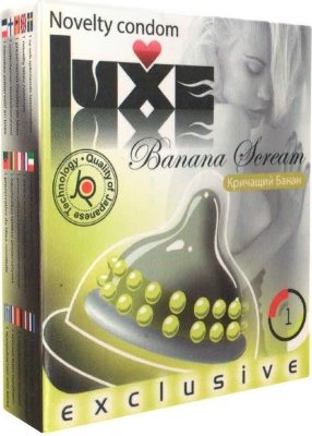 Презерватив LUXE Exclusive Кричащий банан - 1 шт. Длина: 18 см. На его поверхности – бананового цвета пупырышки. Его использование может заставить женщину кричать от наслаждения. Он - это… «Кричащий банан» - презерватив, способный сделать близость защищённой и сладострастной. Член проникает всё глубже, пупырышки нежно массируют стеночки, ритм ускоряется… О! Ах! Ммм! Номинальная ширина - 52 мм. Толщина стенок - 0,06 мм. - Регистрационное удостоверение РФ: ФСЗ 2008/01056 - Дата регистрации медицинского изделия: 20.08.2015 г. - Срок действия регистрационного удостоверения: бессрочно - Представитель изготовителя медицинского изделия: ООО «Трио-Люкс», 105182, Россия, Москва, Щелковское шоссе, вл. 10А, стр. 1 - Номер модели: 3472237. Страна: Китай. Материал: латекс. Объем: 1 шт.